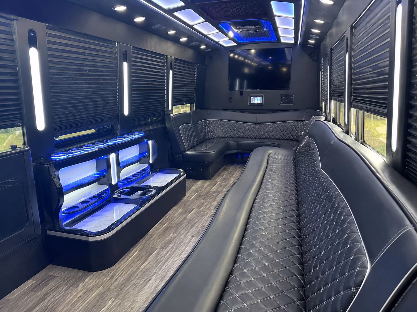 Wedding guests seated inside a party bus serving Oklahoma City